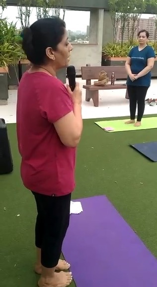 Dr. Sunita leading yoga class