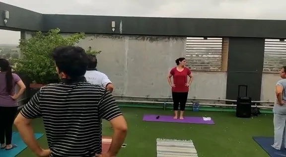 Dr. Sunita teaching outdoor yoga